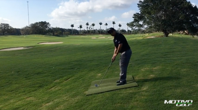 Adjustments When Striking On A Downhill Lie